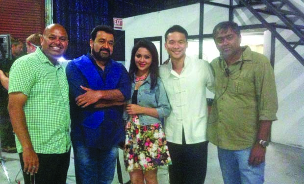 John Wusah with Mohanlal and the Peruchazhi team John Wusah with Mohanlal and the Peruchazhi team